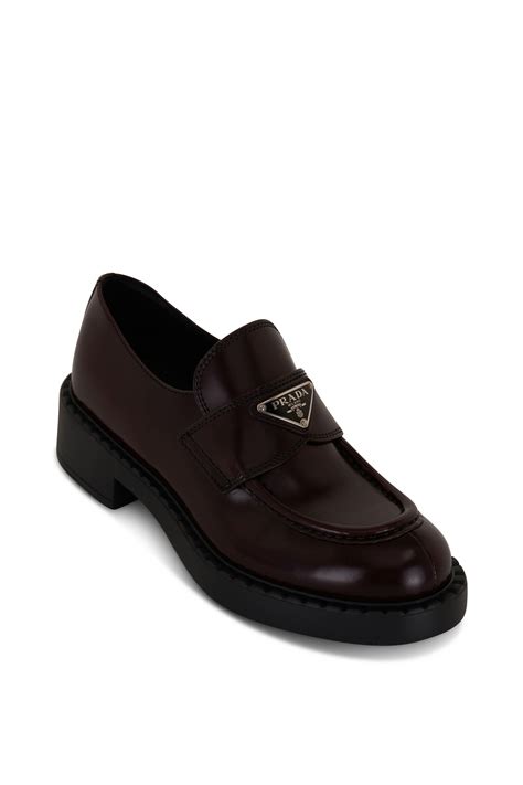 burgundy prada loafers.